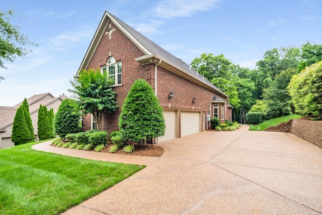 241 King Arthur Cir, Franklin, TN 37067 - view of property exterior with brick siding, driveway, and a yard