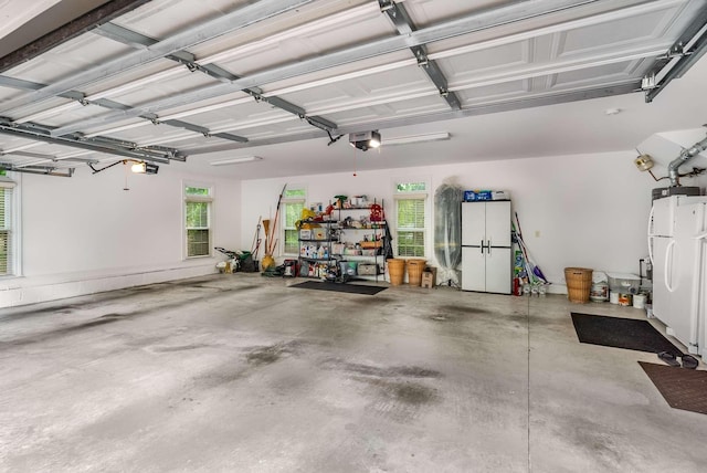 241 King Arthur Cir, Franklin, TN 37067 - garage with a garage door opener and washer / clothes dryer