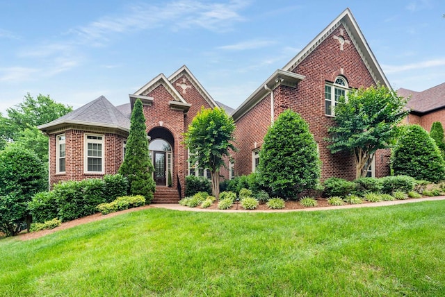 241 King Arthur Cir, Franklin, TN 37067 - view of front of home featuring brick siding and a front lawn