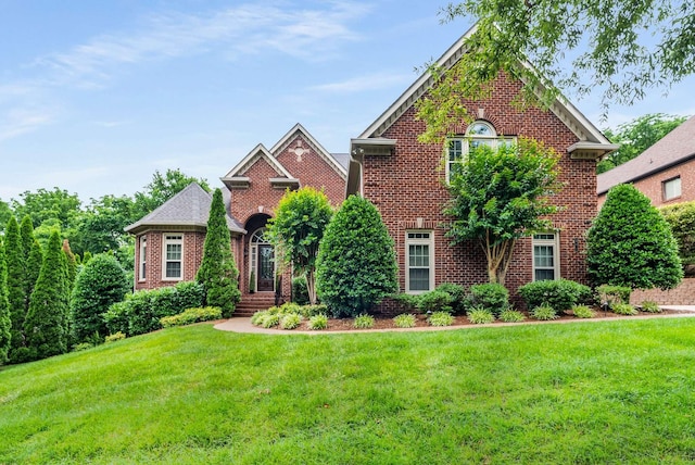241 King Arthur Cir, Franklin, TN 37067 - colonial home with brick siding and a front yard