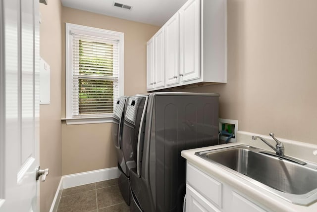 241 King Arthur Cir, Franklin, TN 37067 - laundry area with washer and dryer, cabinet space, and tile patterned floors