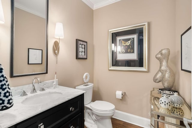 241 King Arthur Cir, Franklin, TN 37067 - bathroom with ornamental molding, vanity, and wood finished floors