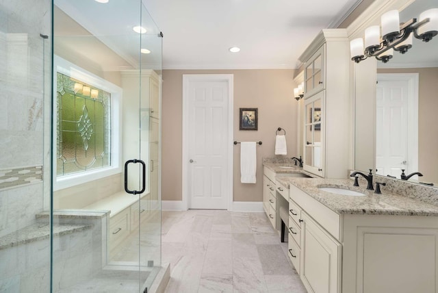 241 King Arthur Cir, Franklin, TN 37067 - bathroom with double vanity, crown molding, marble finish floors, a shower stall, and recessed lighting