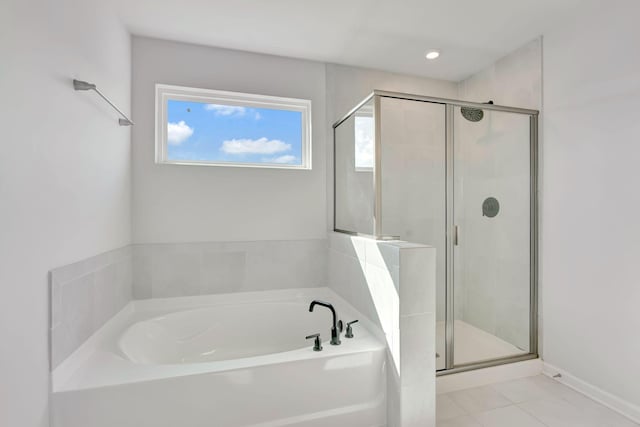 120 Millbrook Dr, Spring Hill, TN 37174 - full bathroom with a bath, a stall shower, and tile patterned floors