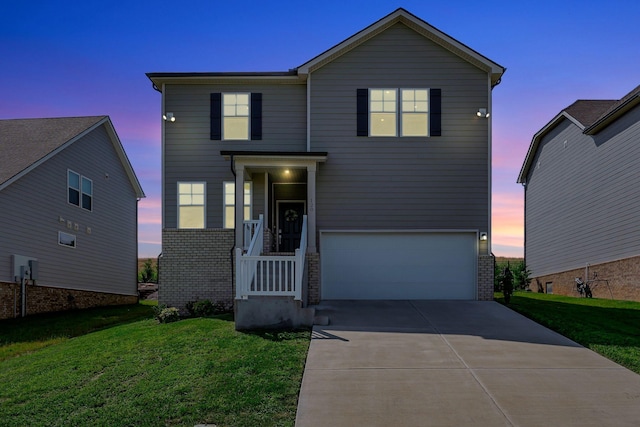 120 Millbrook Dr, Spring Hill, TN 37174 - view of front of house featuring brick siding, a garage, a lawn, and concrete driveway