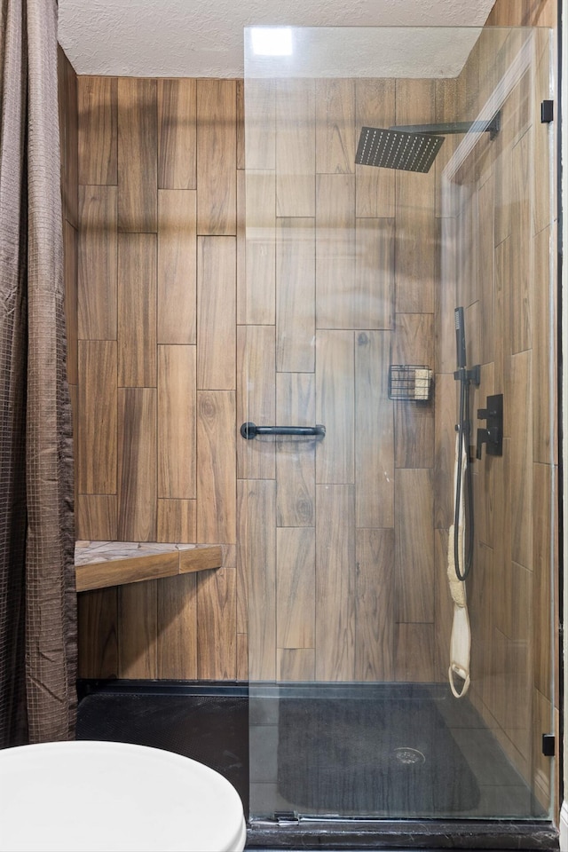 1060 Anderson Ridge Rd, Jasper, TN 37347 - bathroom featuring a shower stall and a textured ceiling