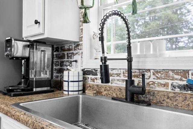 1060 Anderson Ridge Rd, Jasper, TN 37347 - kitchen view of white cabinets and decorative backsplash