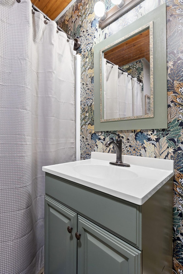 1060 Anderson Ridge Rd, Jasper, TN 37347 - bathroom featuring wallpapered walls, vanity, and curtained shower