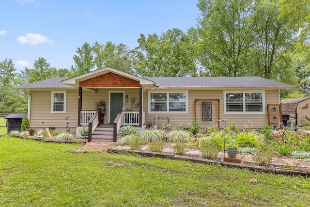 1060 Anderson Ridge Rd, Jasper, TN 37347 - view of front of property with covered porch, a front lawn, and a shingled roof
