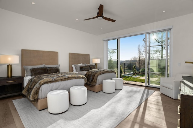 7346 Harlow Dr, College Grove, TN 37046 - bedroom featuring wood finished floors, access to exterior, a ceiling fan, and recessed lighting