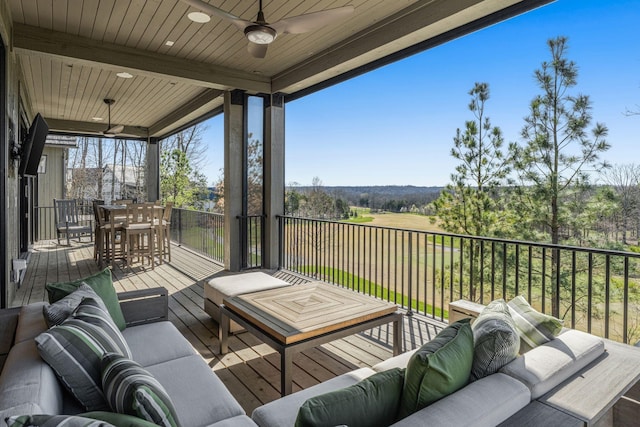 7346 Harlow Dr, College Grove, TN 37046 - wooden deck featuring outdoor lounge area, ceiling fan, and outdoor dining space