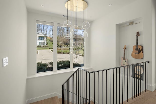 7346 Harlow Dr, College Grove, TN 37046 - stairway with wood finished floors and recessed lighting
