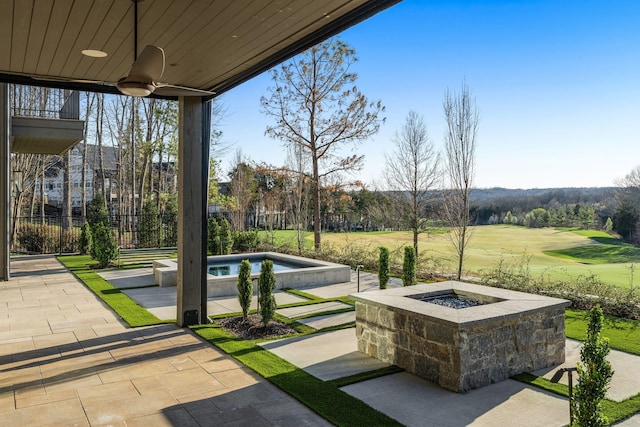 7346 Harlow Dr, College Grove, TN 37046 - view of patio / terrace with a fire pit, a swimming pool, golf course view, and ceiling fan