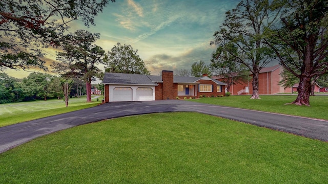 700 S 16th St, Murray, KY 42071 - single story home featuring driveway, a chimney, a garage, and a lawn