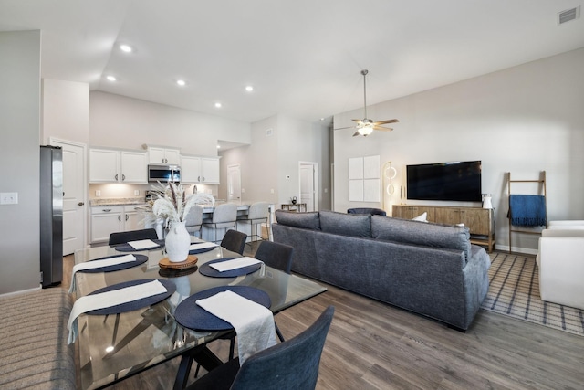 260 Thorpe Dr, Spring Hill, TN 37174 - dining area featuring a high ceiling, ceiling fan, wood finished floors, and recessed lighting