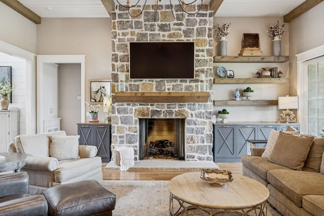 1208 Potter Ln, Gallatin, TN 37066 - living room with wood finished floors and a stone fireplace