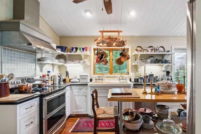 232 Hollingsworth Cove Rd, Monteagle, TN 37356 - kitchen with double oven range, open shelves, custom exhaust hood, wood ceiling, and a ceiling fan