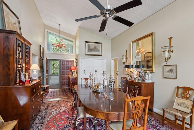 232 Hollingsworth Cove Rd, Monteagle, TN 37356 - dining space with wood finished floors, high vaulted ceiling, a chandelier, and a ceiling fan
