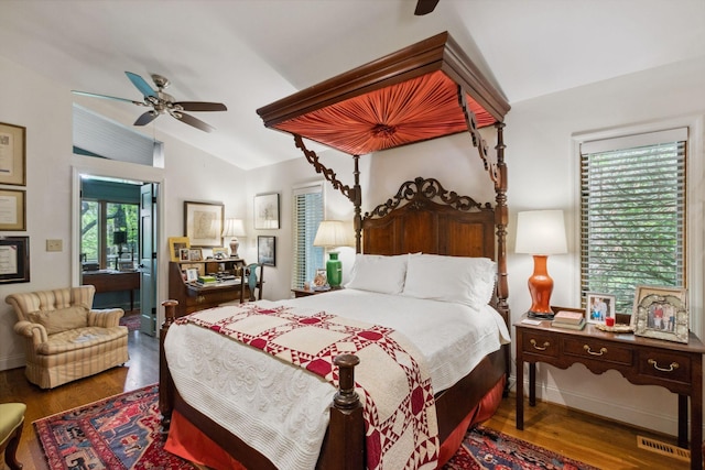 232 Hollingsworth Cove Rd, Monteagle, TN 37356 - bedroom featuring vaulted ceiling, wood finished floors, connected bathroom, and ceiling fan