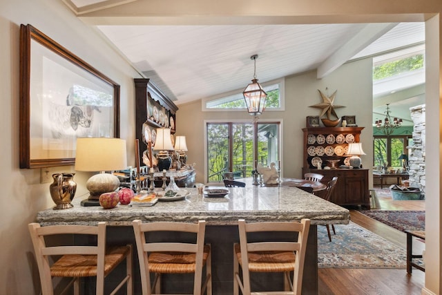 232 Hollingsworth Cove Rd, Monteagle, TN 37356 - dining room with dark wood finished floors and vaulted ceiling