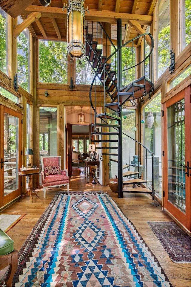 232 Hollingsworth Cove Rd, Monteagle, TN 37356 - living area with a towering ceiling, healthy amount of natural light, stairway, wood-type flooring, and wood ceiling