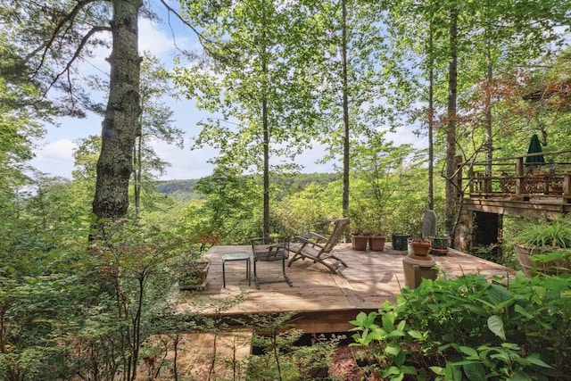 232 Hollingsworth Cove Rd, Monteagle, TN 37356 - wooden deck featuring a forest view