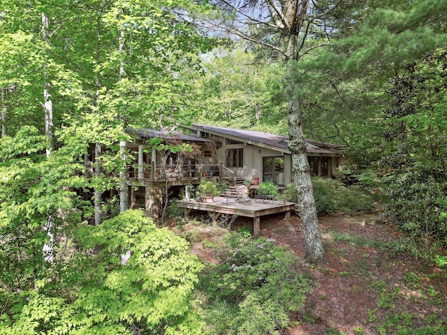 232 Hollingsworth Cove Rd, Monteagle, TN 37356 - back of property featuring a wooden deck and a view of trees