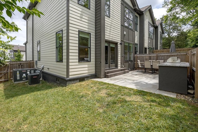 206 Ben Allen Rd Unit 5, Nashville, TN 37207 - rear view of property featuring entry steps, crawl space, a patio, and a fenced backyard
