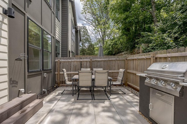 206 Ben Allen Rd Unit 5, Nashville, TN 37207 - view of patio featuring a grill and outdoor dining area