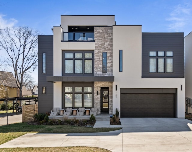 1209 Noelton Ave, Nashville, TN 37215 - modern home featuring stone siding, stucco siding, driveway, and an attached garage