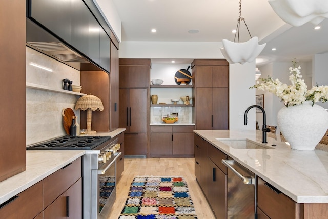 1209 Noelton Ave, Nashville, TN 37215 - kitchen featuring open shelves, high quality appliances, light wood-type flooring, tasteful backsplash, and recessed lighting