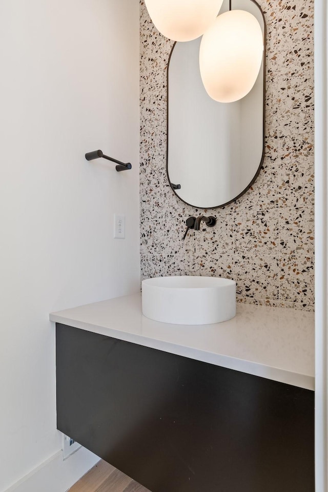 1209 Noelton Ave, Nashville, TN 37215 - bathroom featuring backsplash, vanity, and wood finished floors