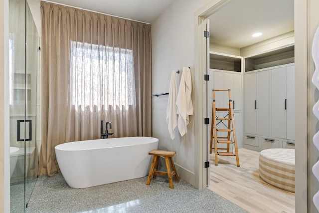 1209 Noelton Ave, Nashville, TN 37215 - full bathroom with a freestanding tub and a shower with door