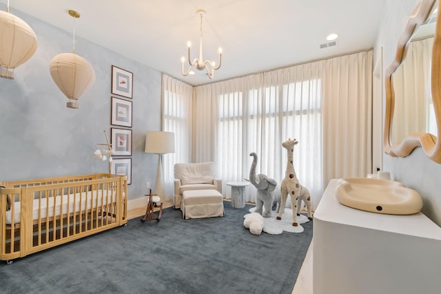 1209 Noelton Ave, Nashville, TN 37215 - bedroom featuring carpet flooring, a chandelier, a crib, and multiple windows