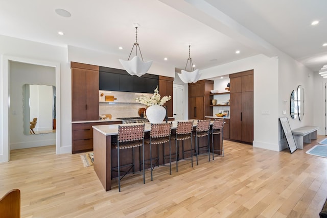 1209 Noelton Ave, Nashville, TN 37215 - kitchen featuring open shelves, modern cabinets, light countertops, light wood-style flooring, and recessed lighting