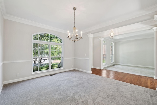 821 Alex Way, Mount Juliet, TN 37122 - spare room featuring a chandelier, carpet, plenty of natural light, ornamental molding, and decorative columns