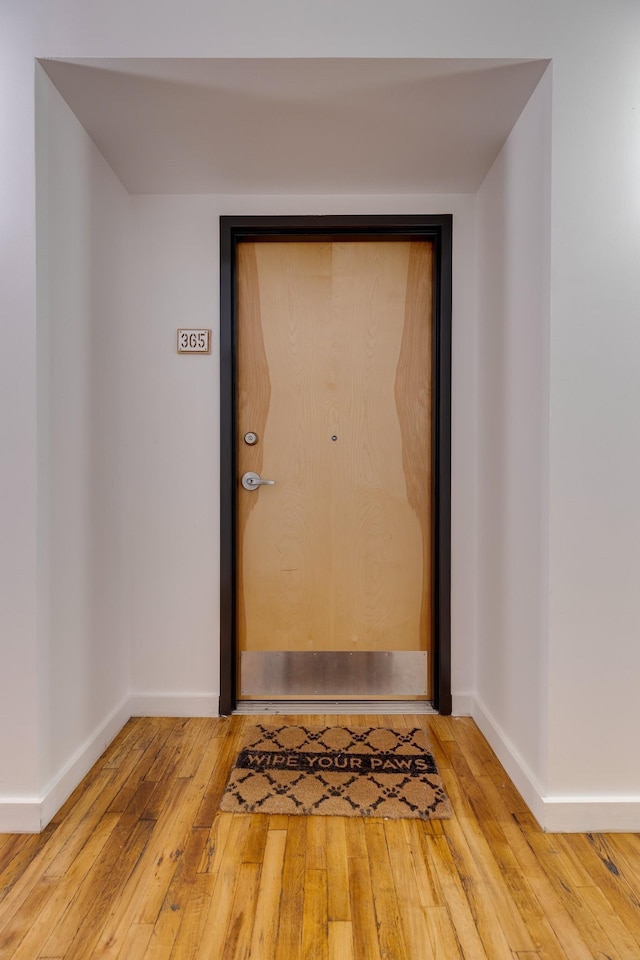 1350 Rosa L Parks Blvd Unit 365, Nashville, TN 37208 - doorway to outside with wood finished floors and baseboards