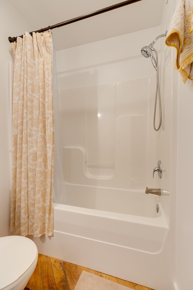 1350 Rosa L Parks Blvd Unit 365, Nashville, TN 37208 - full bath with shower / tub combo with curtain and wood finished floors