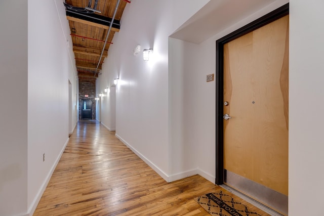 1350 Rosa L Parks Blvd Unit 365, Nashville, TN 37208 - corridor with light wood-type flooring, a high ceiling, and beamed ceiling
