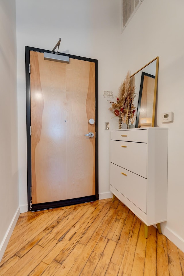 1350 Rosa L Parks Blvd Unit 365, Nashville, TN 37208 - foyer entrance featuring light wood finished floors and baseboards