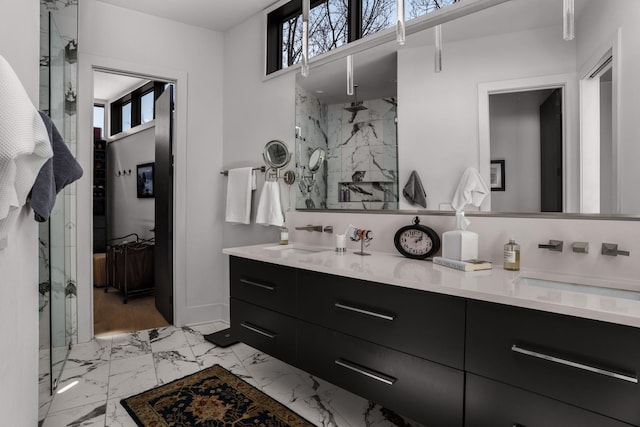 108 46th Ave N, Nashville, TN 37209 - full bathroom featuring double vanity, a marble finish shower, plenty of natural light, and marble finish flooring