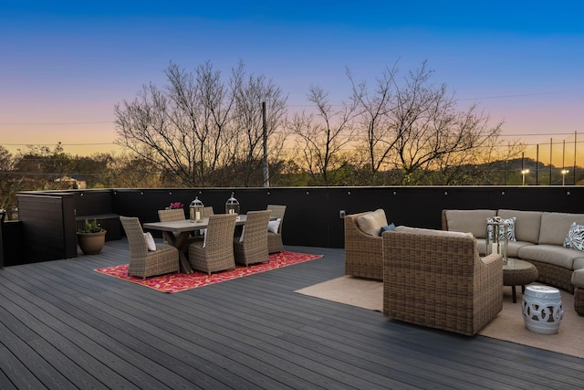 108 46th Ave N, Nashville, TN 37209 - deck at dusk featuring an outdoor living space and outdoor dining area