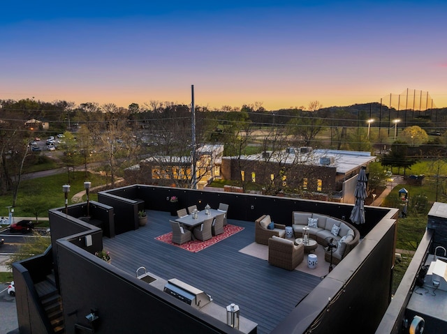 108 46th Ave N, Nashville, TN 37209 - wooden terrace with an outdoor living space