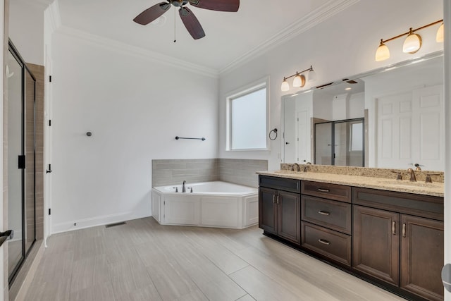438 Truman Rd, Franklin, TN 37064 - bathroom with ceiling fan, a stall shower, double vanity, crown molding, and a bath