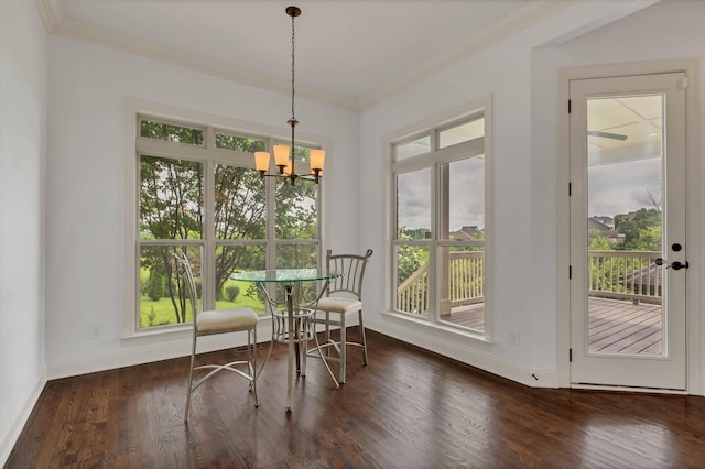 438 Truman Rd, Franklin, TN 37064 - dining area with crown molding, a chandelier, healthy amount of natural light, and wood finished floors