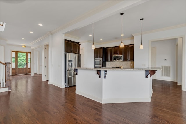 438 Truman Rd, Franklin, TN 37064 - kitchen featuring stainless steel appliances, ornamental molding, dark brown cabinetry, a kitchen breakfast bar, and tasteful backsplash