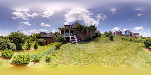 438 Truman Rd, Franklin, TN 37064 - back of house featuring stairway, a lawn, and a porch