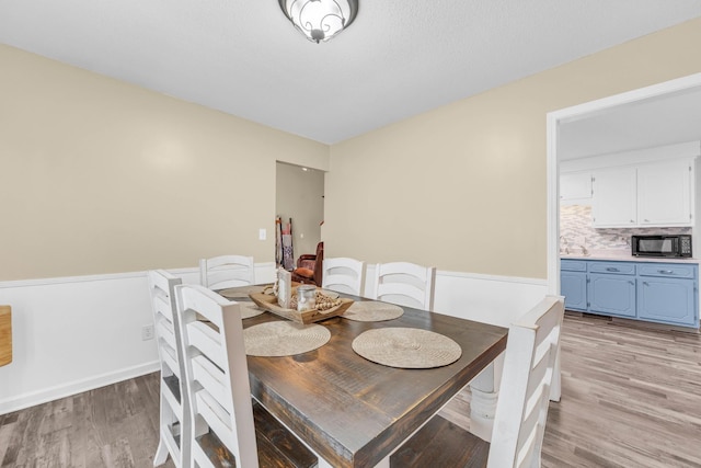 110 Sandis Ln, Palmyra, TN 37142 - dining space with light wood finished floors
