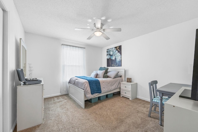 110 Sandis Ln, Palmyra, TN 37142 - bedroom featuring light colored carpet, a textured ceiling, a ceiling fan, and an office area