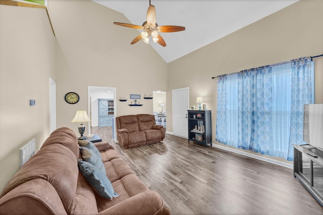 110 Sandis Ln, Palmyra, TN 37142 - living room with high vaulted ceiling, ceiling fan, and wood finished floors